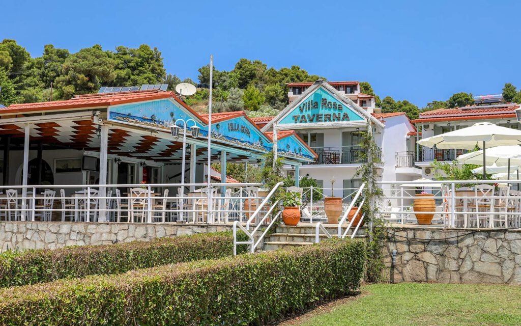 Experience the best Greek night in Skiathos at Villa Rosa! From our Troulos pool bar with sunbeds to an authentic Greek taverna featuring live music, authentic Greek food, and traditional dancing. Book your table for a legendary evening in Troulos.