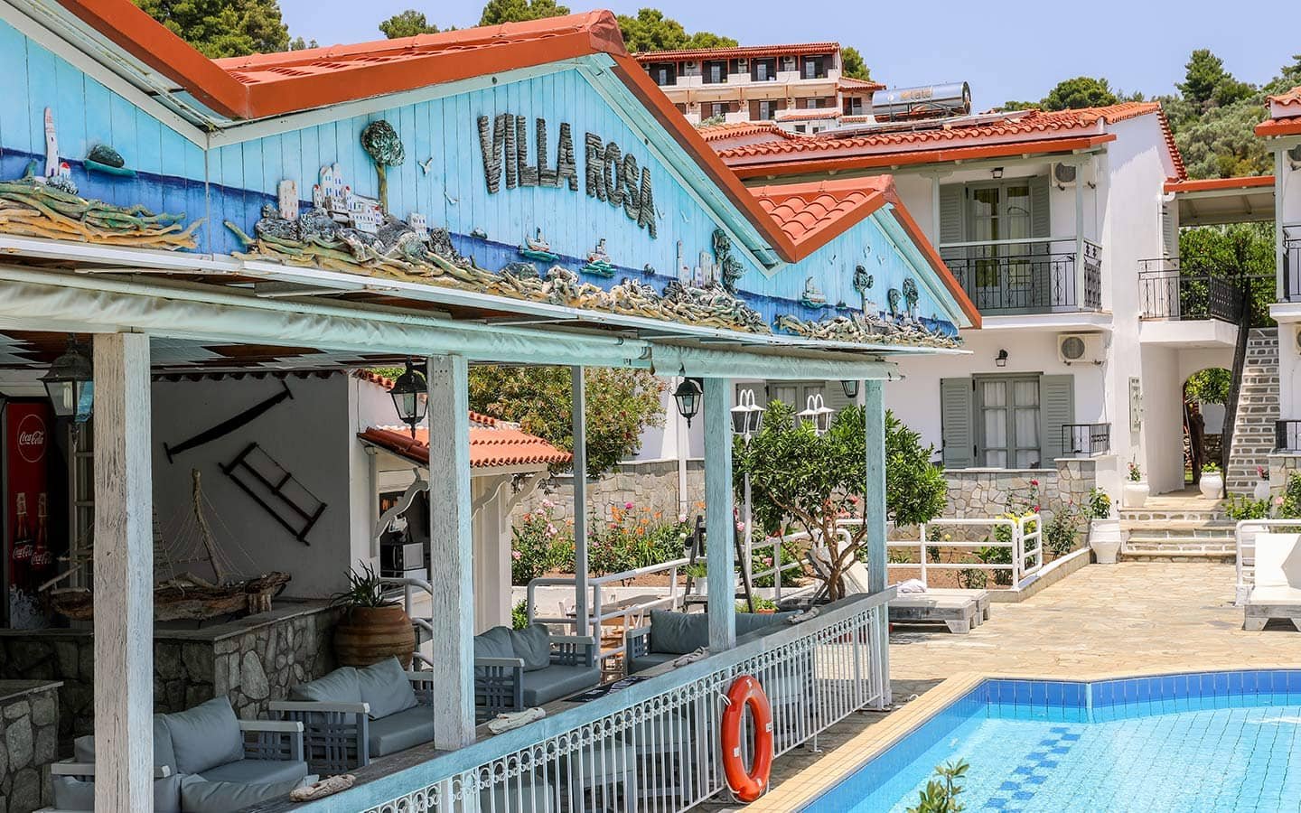 Experience the best Greek night in Skiathos at Villa Rosa! From our Troulos pool bar with sunbeds to an authentic Greek taverna featuring live music, authentic Greek food, and traditional dancing. Book your table for a legendary evening in Troulos.