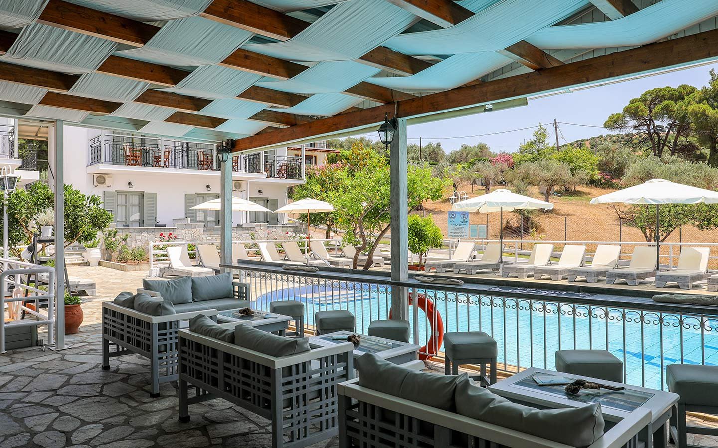 Experience the best Greek night in Skiathos at Villa Rosa! From our Troulos pool bar with sunbeds to an authentic Greek taverna featuring live music, authentic Greek food, and traditional dancing. Book your table for a legendary evening in Troulos.