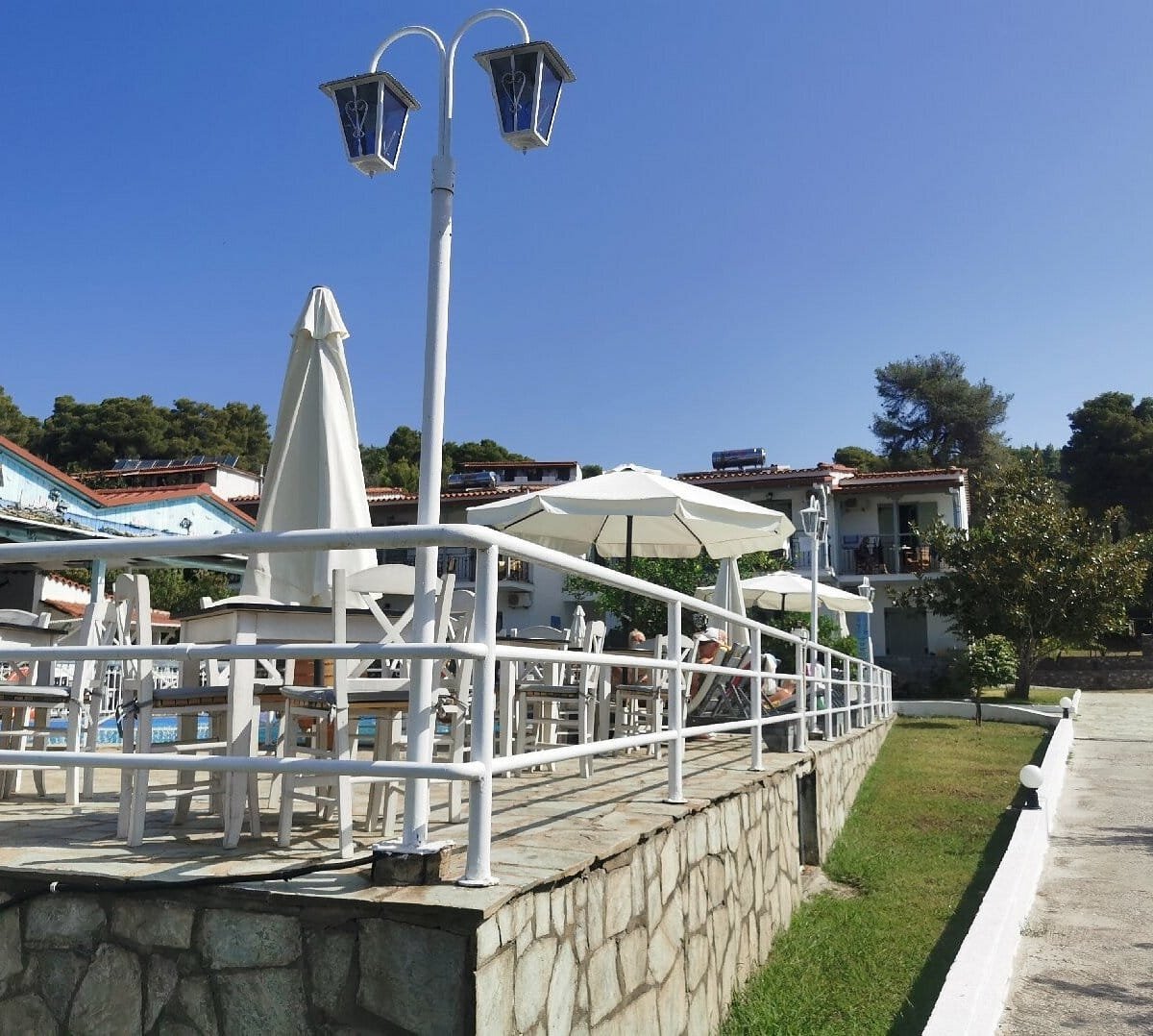 Experience the best Greek night in Skiathos at Villa Rosa! From our Troulos pool bar with sunbeds to an authentic Greek taverna featuring live music, authentic Greek food, and traditional dancing. Book your table for a legendary evening in Troulos.