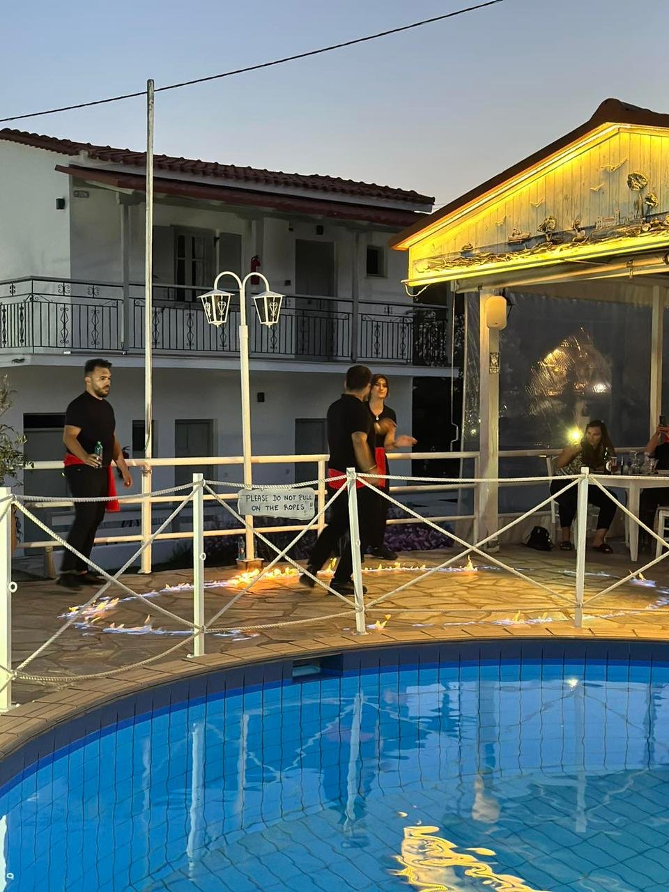 Experience the best Greek night in Skiathos at Villa Rosa! From our Troulos pool bar with sunbeds to an authentic Greek taverna featuring live music, authentic Greek food, and traditional dancing. Book your table for a legendary evening in Troulos.