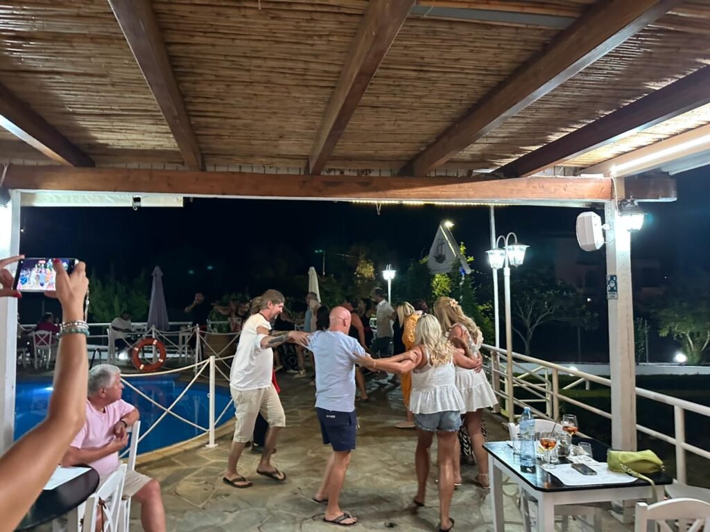 Experience the best Greek night in Skiathos at Villa Rosa! From our Troulos pool bar with sunbeds to an authentic Greek taverna featuring live music, authentic Greek food, and traditional dancing. Book your table for a legendary evening in Troulos.