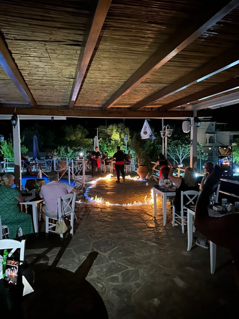 Experience the best Greek night in Skiathos at Villa Rosa! From our Troulos pool bar with sunbeds to an authentic Greek taverna featuring live music, authentic Greek food, and traditional dancing. Book your table for a legendary evening in Troulos.